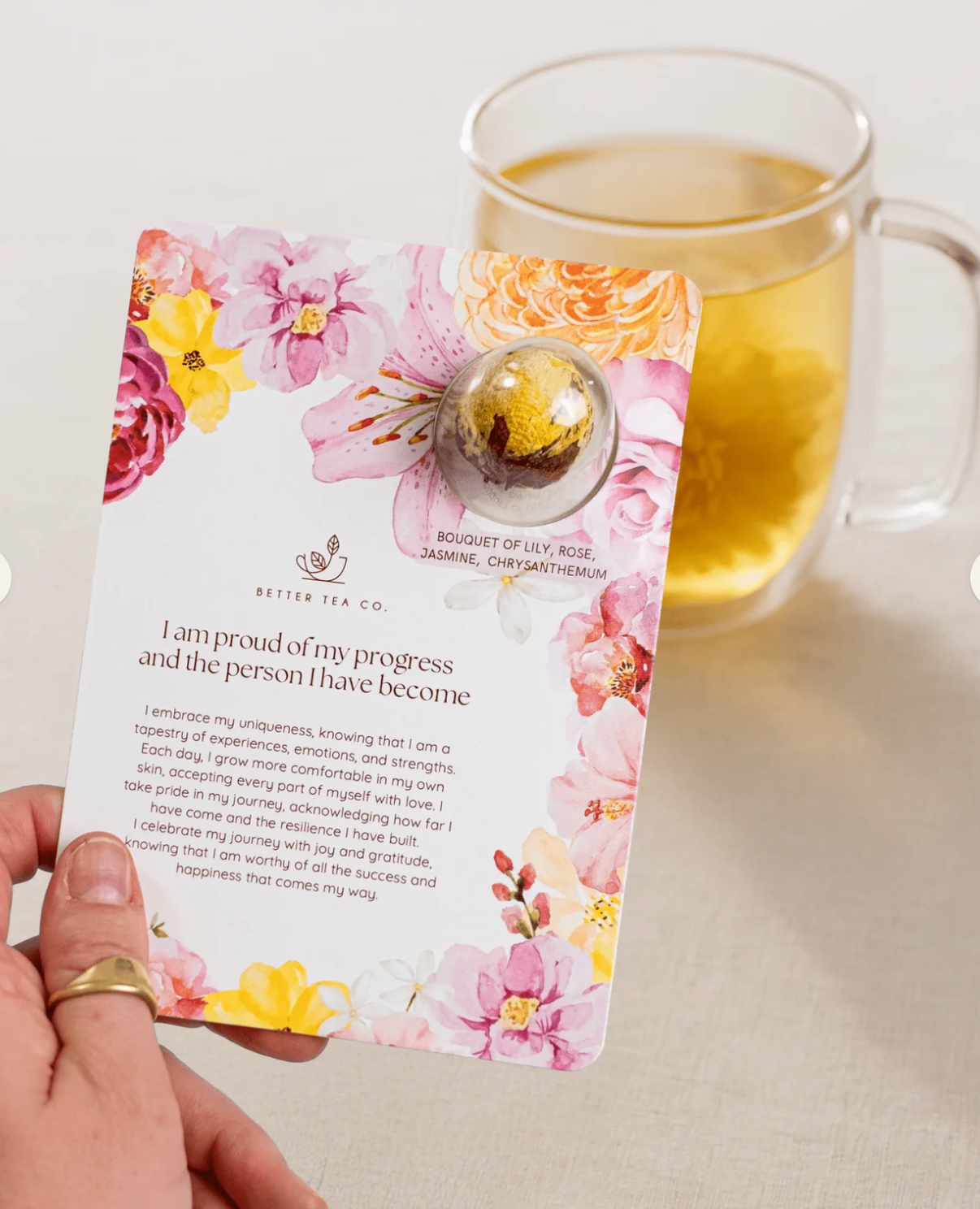 Blooming tea ball on a card with affirmation text