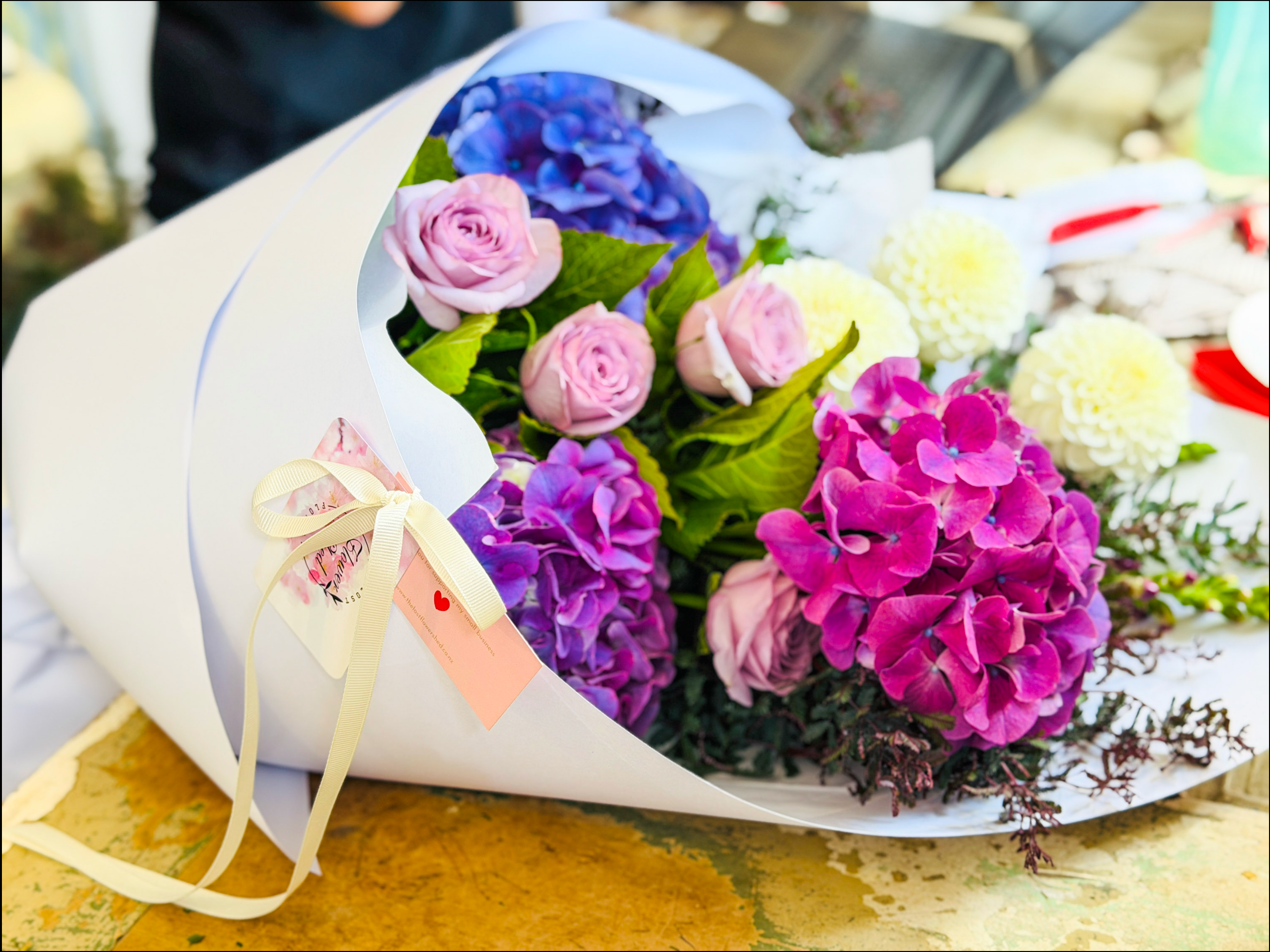 Florist's choice bouquet wrapped ready for delivery