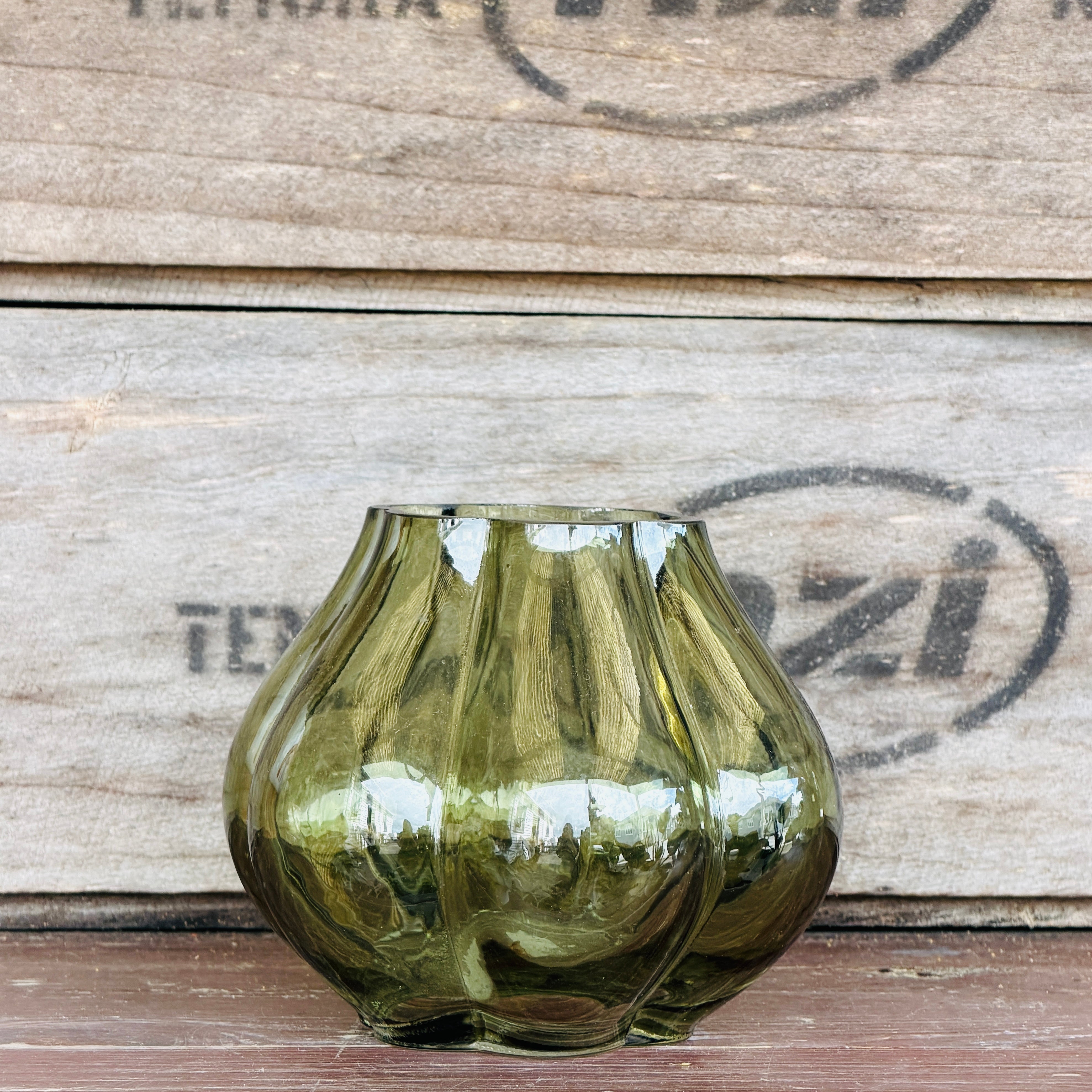 Small green glass vase