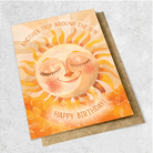Card with a picture of the sun that says another trip around the sun