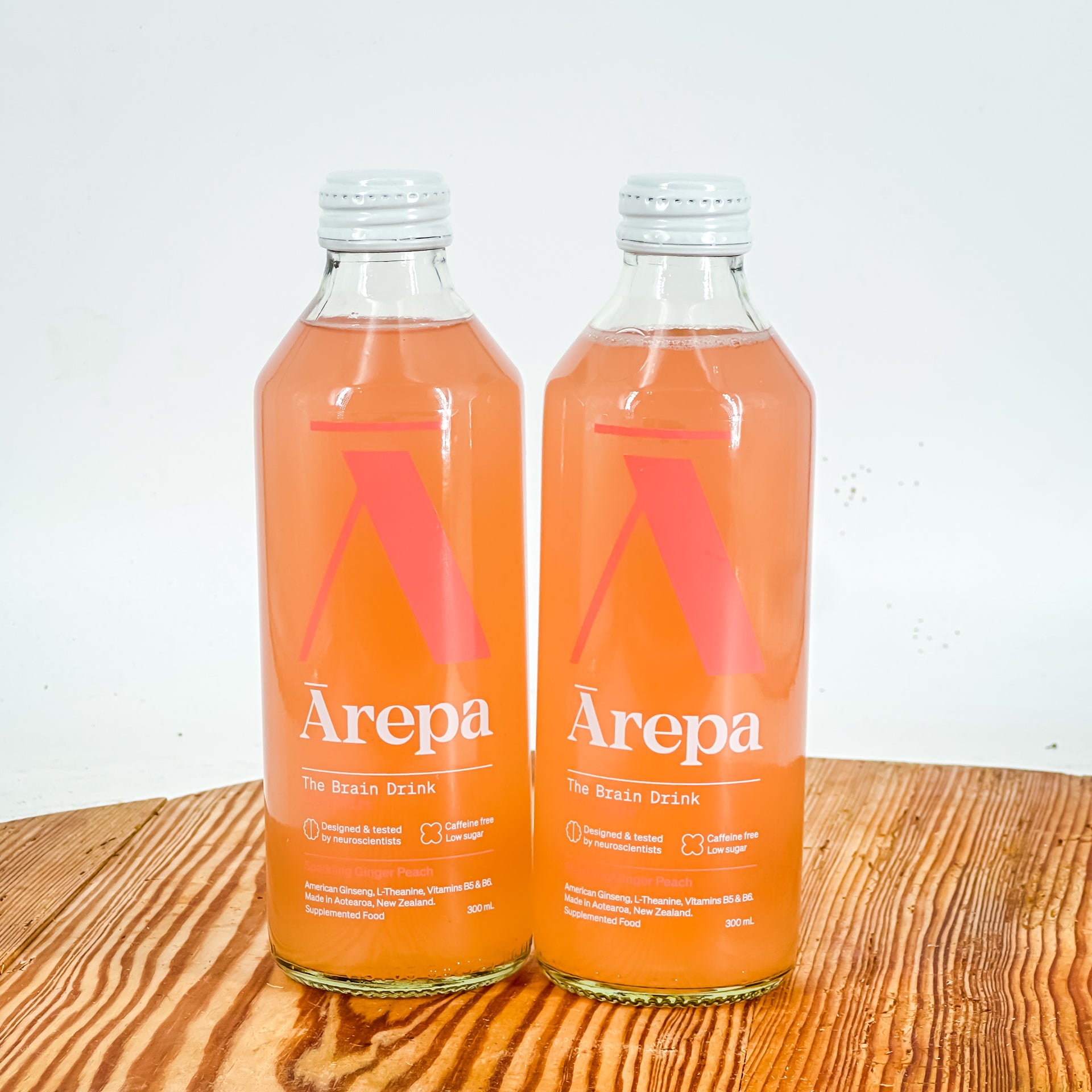 Bottles of Arepa Sparkling black current drink