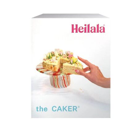 Caker cake mix box with eggs on a table