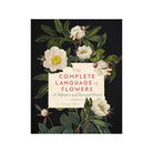 A book of the complete Language of Flowers with a green vase of peonies