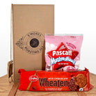 S’mores kit with forks and a packet of biscuits and a packet of marshmallows