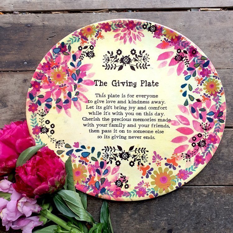 a large plate with a poem about giving