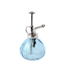 Glass plant mister with metal spout