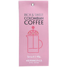 A bag pink bag of columbian coffee