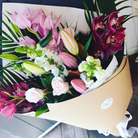 bouquet of pink orchids, roses, snap dragons 