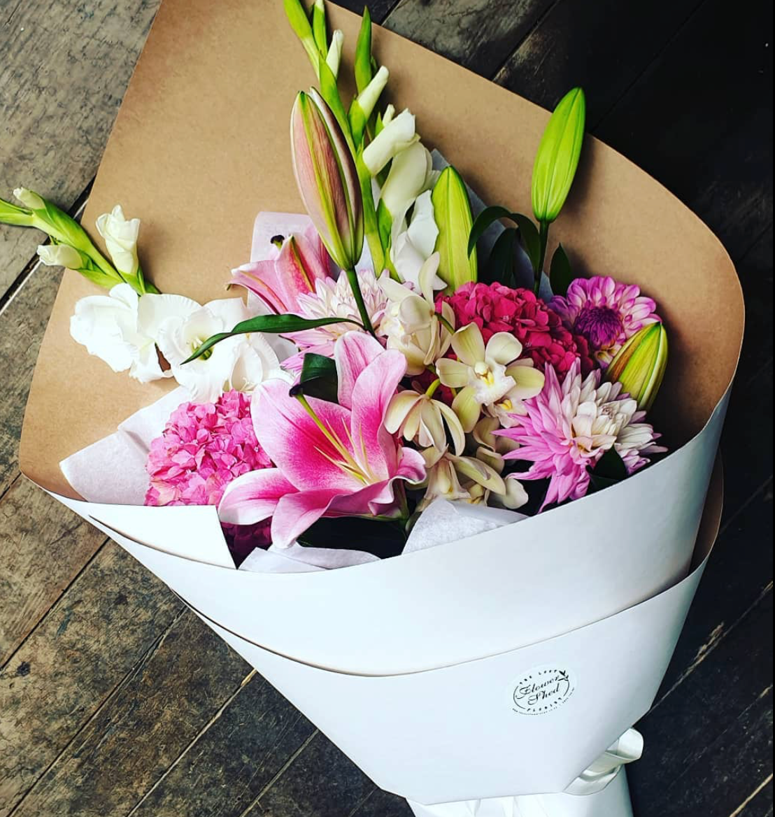 pink bouquet of pink lilies, hydrangeas, dahlias
