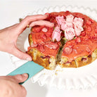 Caker cake mix box with eggs on a table