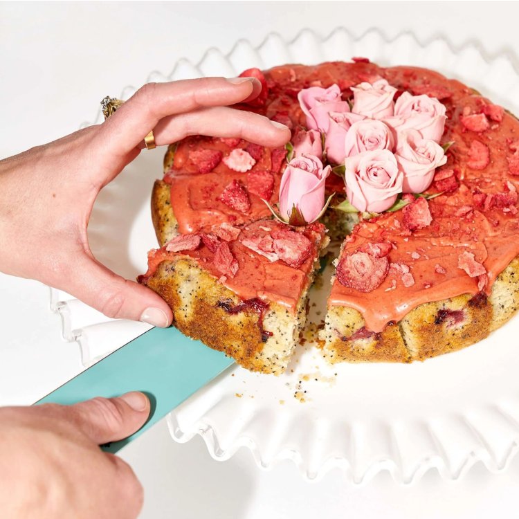 Caker cake mix box with eggs on a table