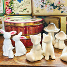 Two ceramic fox ornaments