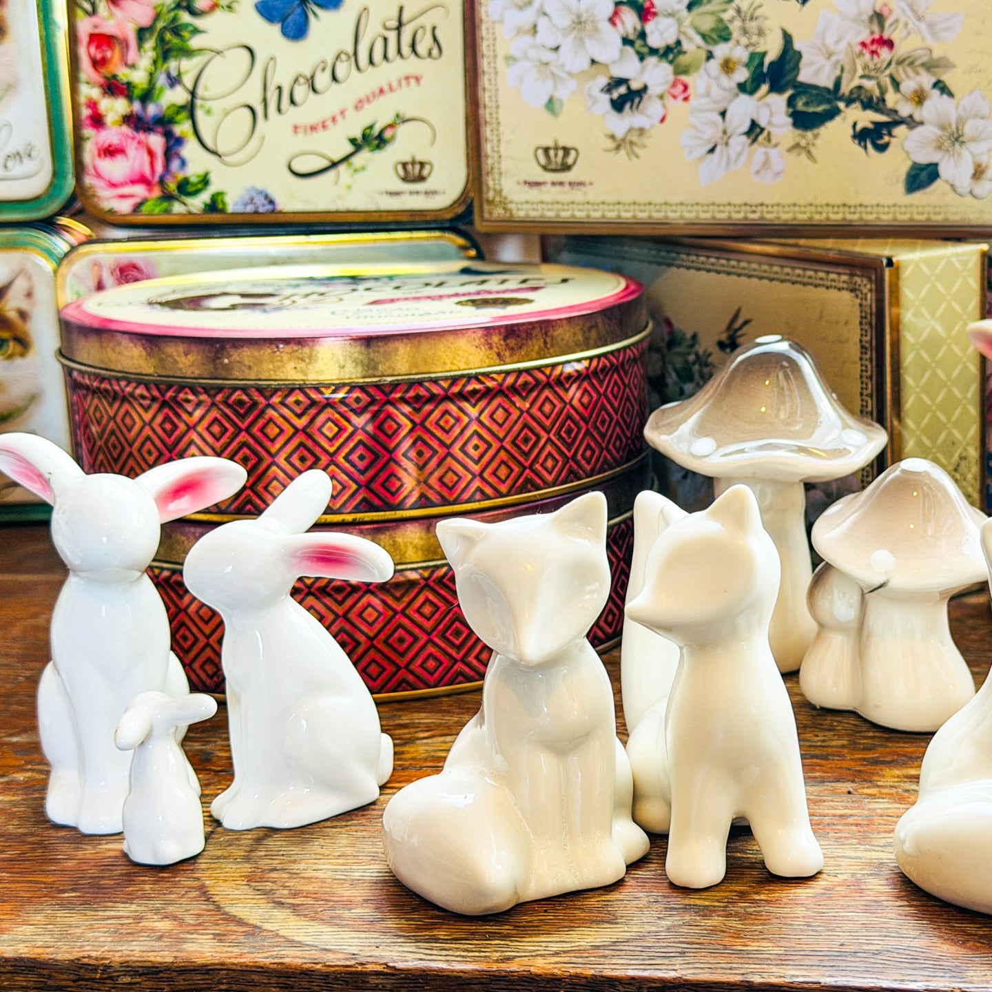 Two ceramic fox ornaments