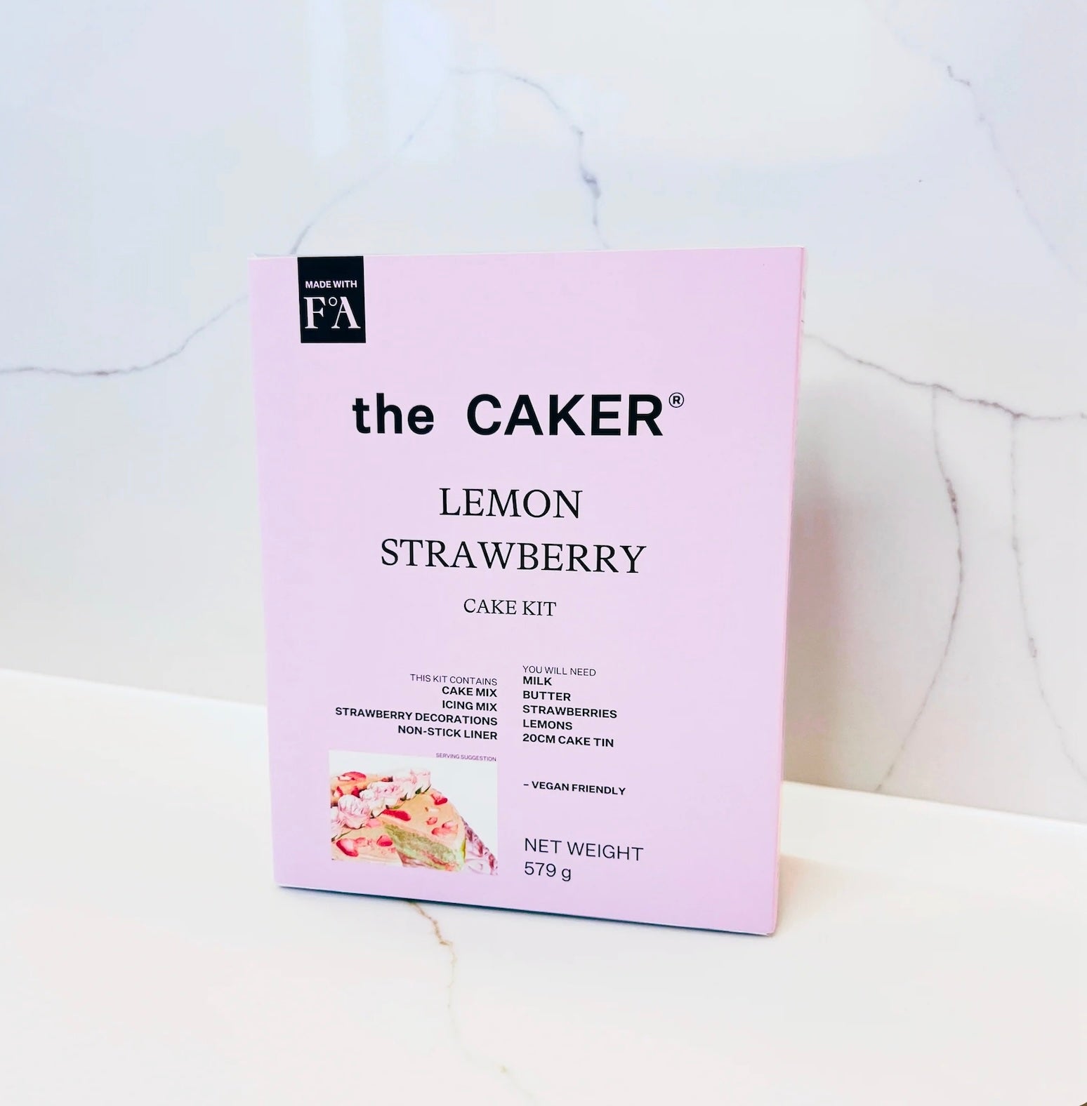 small bouquet or posy with a  Caker' kit on a wooden surface.