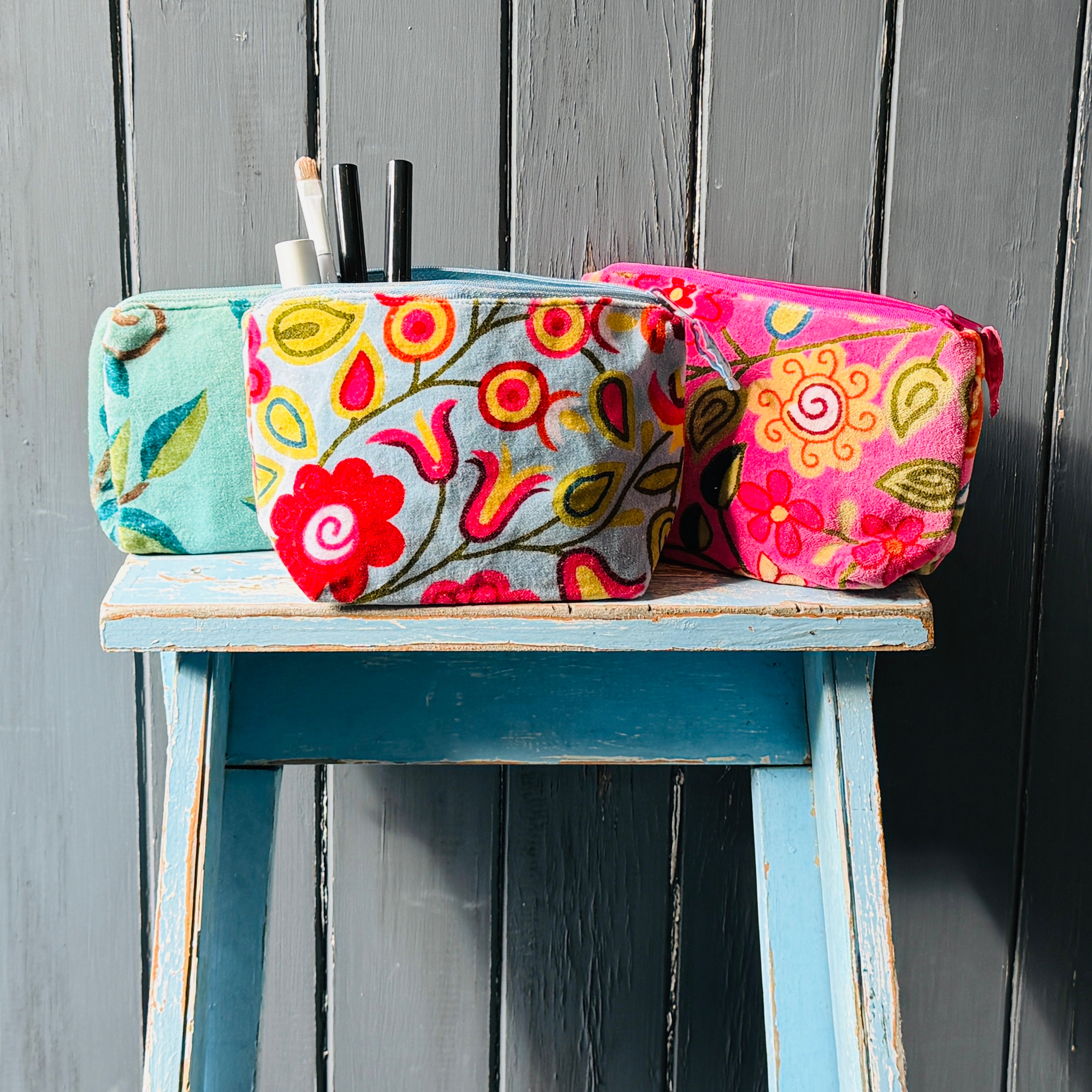 collection of makeup bags