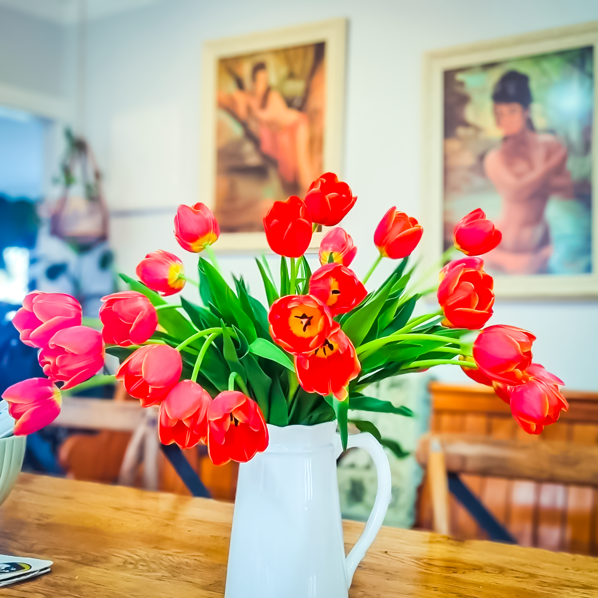 fresh tulip steps in a vase on a table