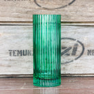 A green glass vase perfect for flowers and gifts